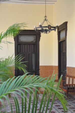 hotel hallway antique guest room doors high ceilings